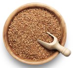 Buckwheat in wood plate isolated