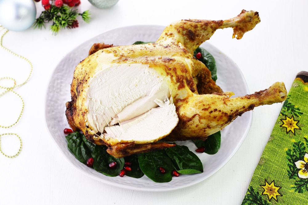 Курица на бутылке в духовке на Новый Год